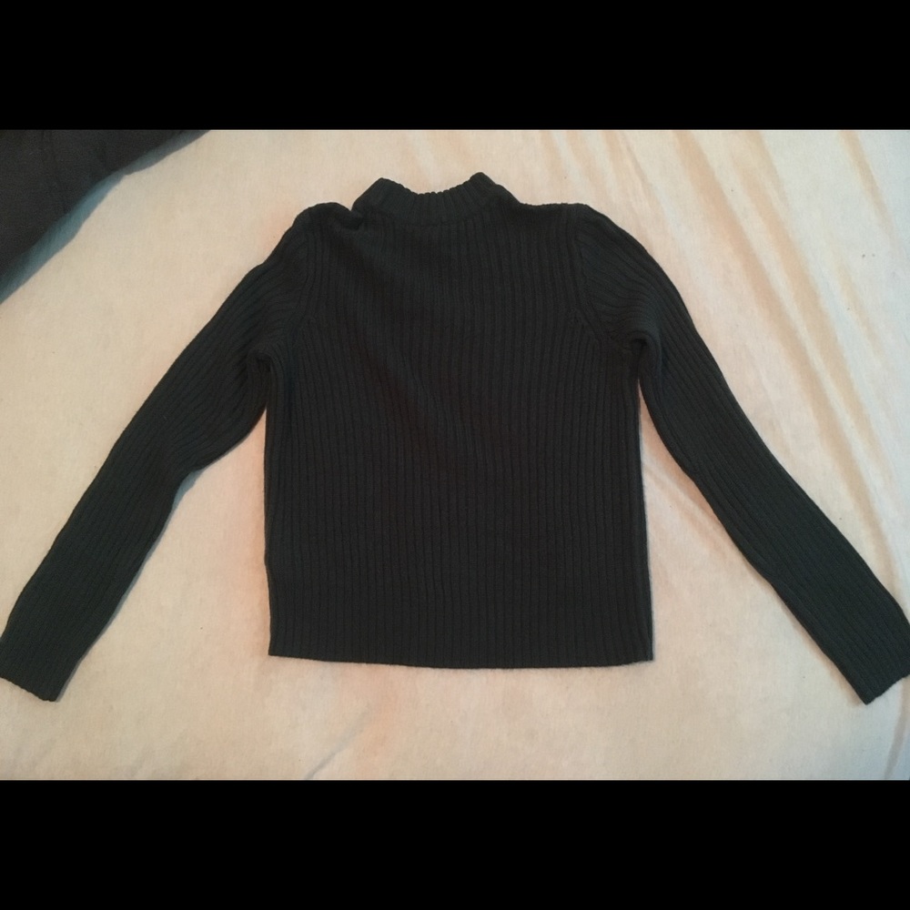 Green turtleneck sweater